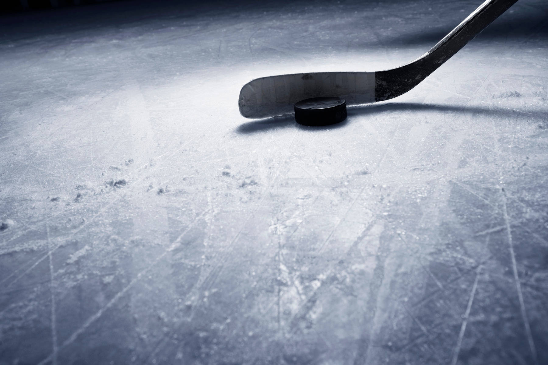 Ice Hockey Stick And Puck Close Up Wallpaper
