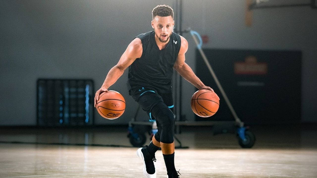 Steph Curry Dribbling Two Basketballs Wallpaper
