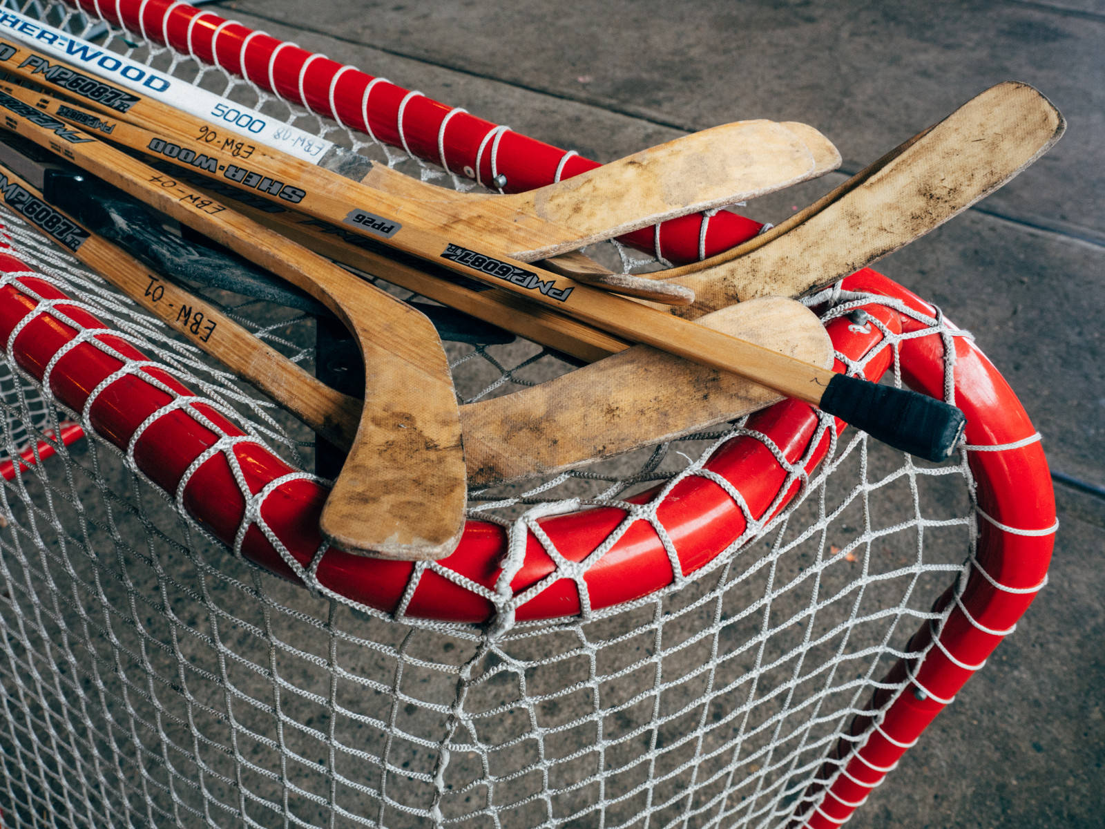Wooden Hockey Sticks Close Up Shot Wallpaper