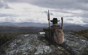 Alone Cowboy On A Mountain Wallpaper