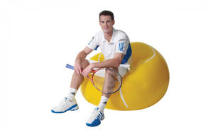 Andy Murray On Tennis Ball Couch Wallpaper