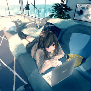 Anime Girl Lies Down Working On Her Laptop Wallpaper