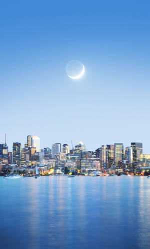 Crescent Moon In Sky Of Seattle Iphone Wallpaper