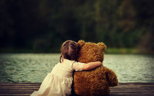 Girl And Teddy Bear Wallpaper