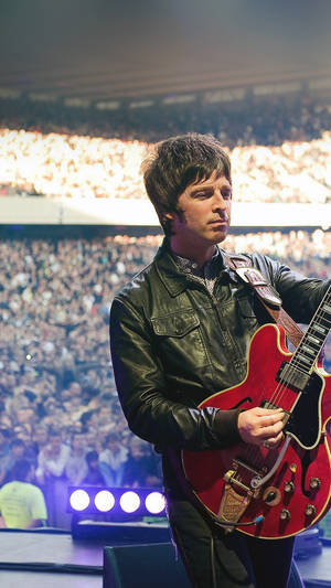 Oasis Noel Playing Guitar Wallpaper