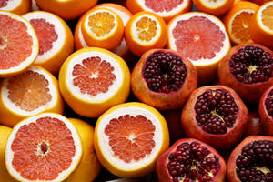 Refreshing Citrus And Pomegranate Fruits Boosting Health Wallpaper