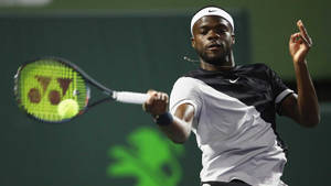 Single Hand Forehand Volley Frances Tiafoe Wallpaper
