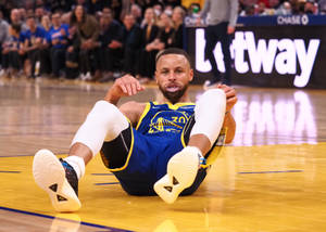 Steph Curry Slipping On The Floor Wallpaper