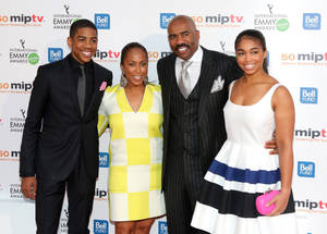 Steve Harvey Enjoying Quality Time With His Family Wallpaper