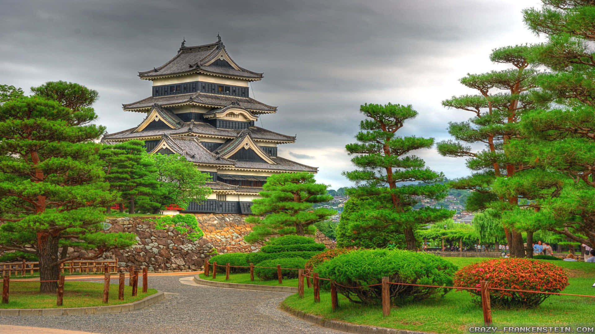 A Castle With Trees And Bushes
