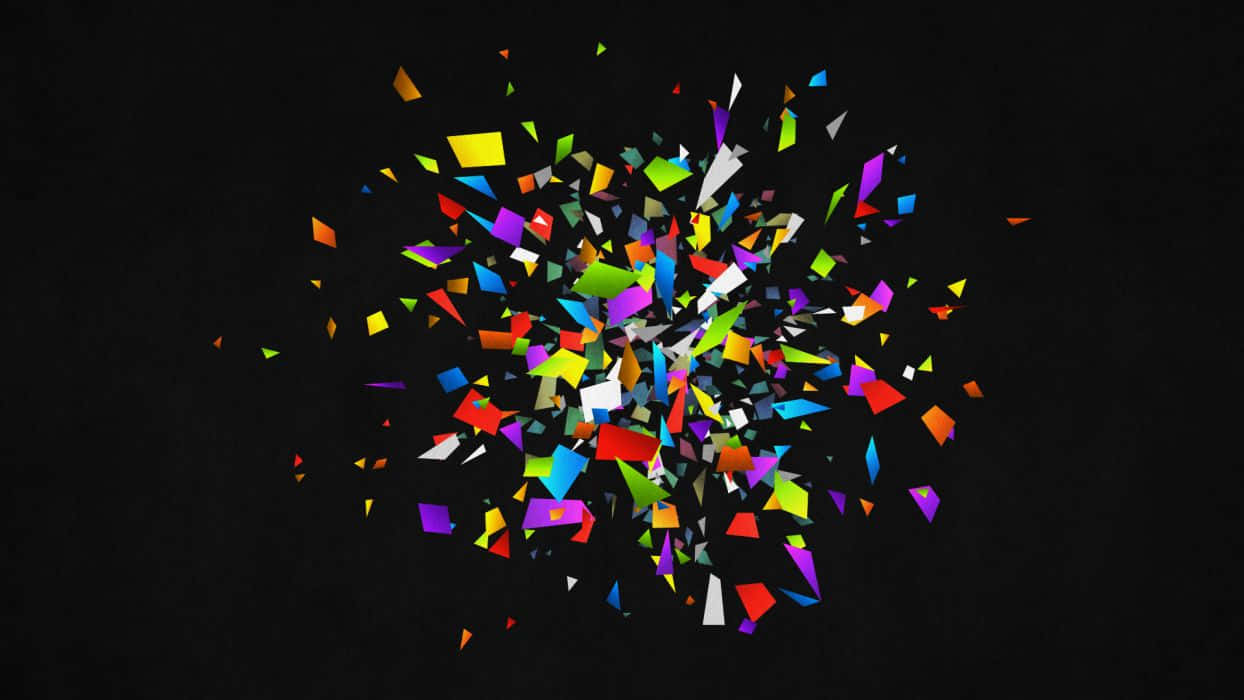 A Colorful Explosion Of Confetti On A Black Background