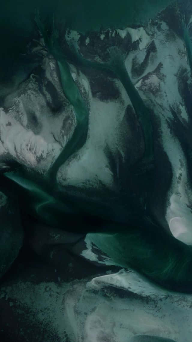 A Green River Is Flowing In The Water