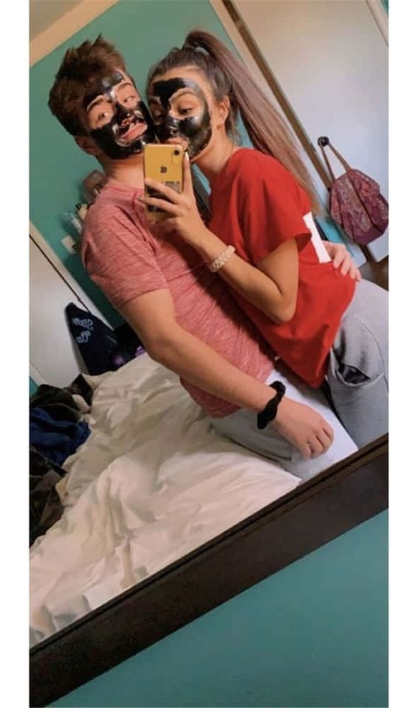 A Loving Boyfriend And Girlfriend Sharing A Special Moment.