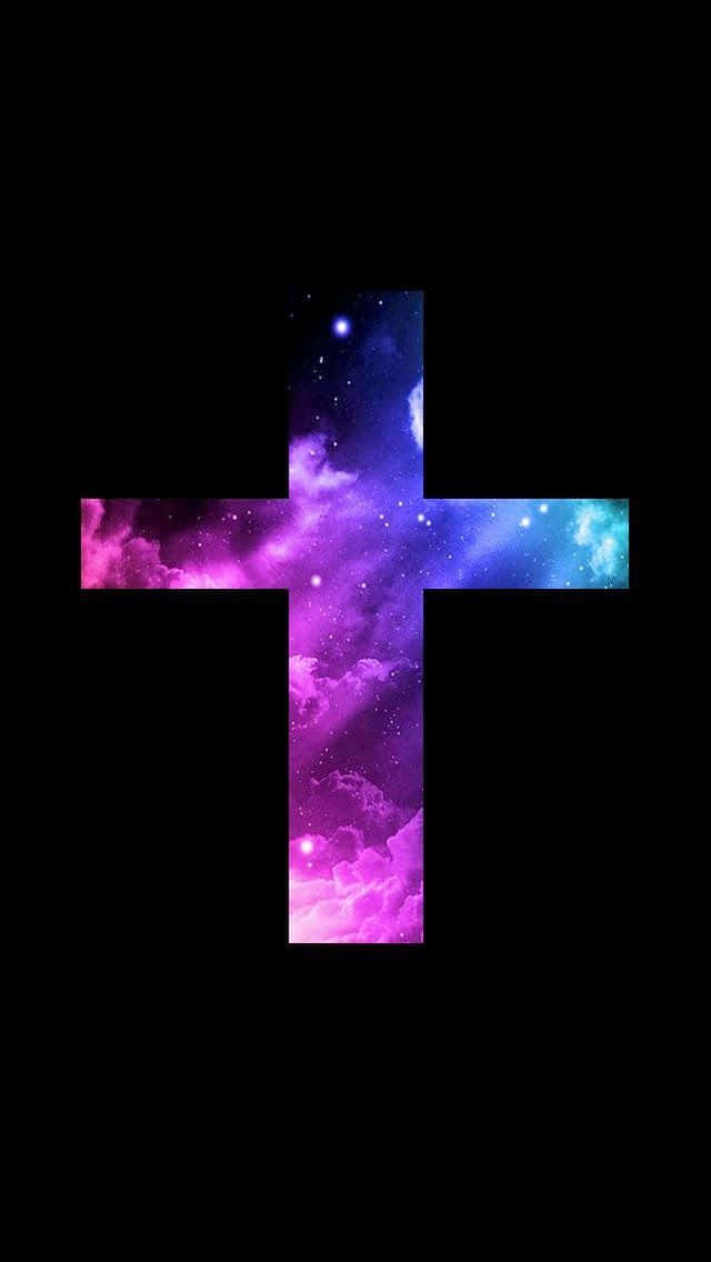 A Pink Cross Suspended Against A White Sky