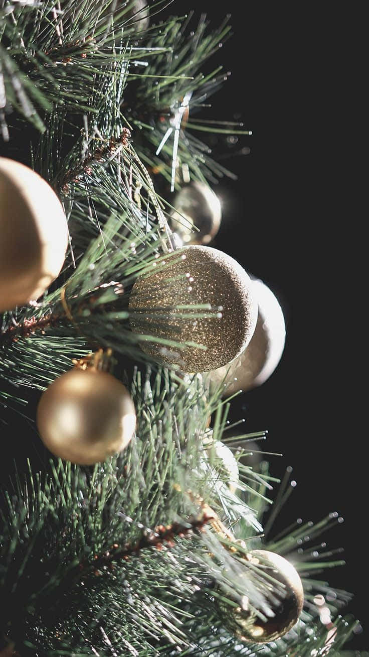 A Unique Christmas Tree With Aesthetic Ornaments And Neon Lights.