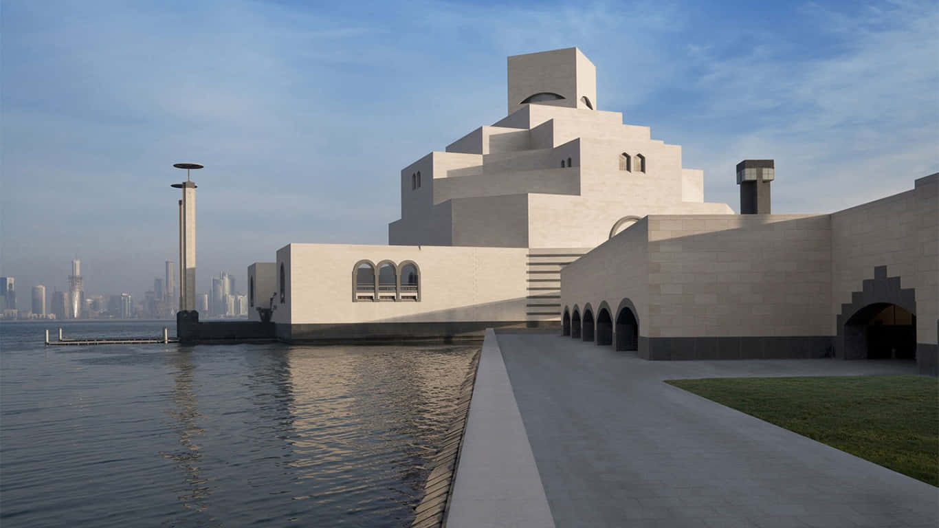 Caption: Majestic Museum Of Islamic Art Beneath A Clear Blue Sky