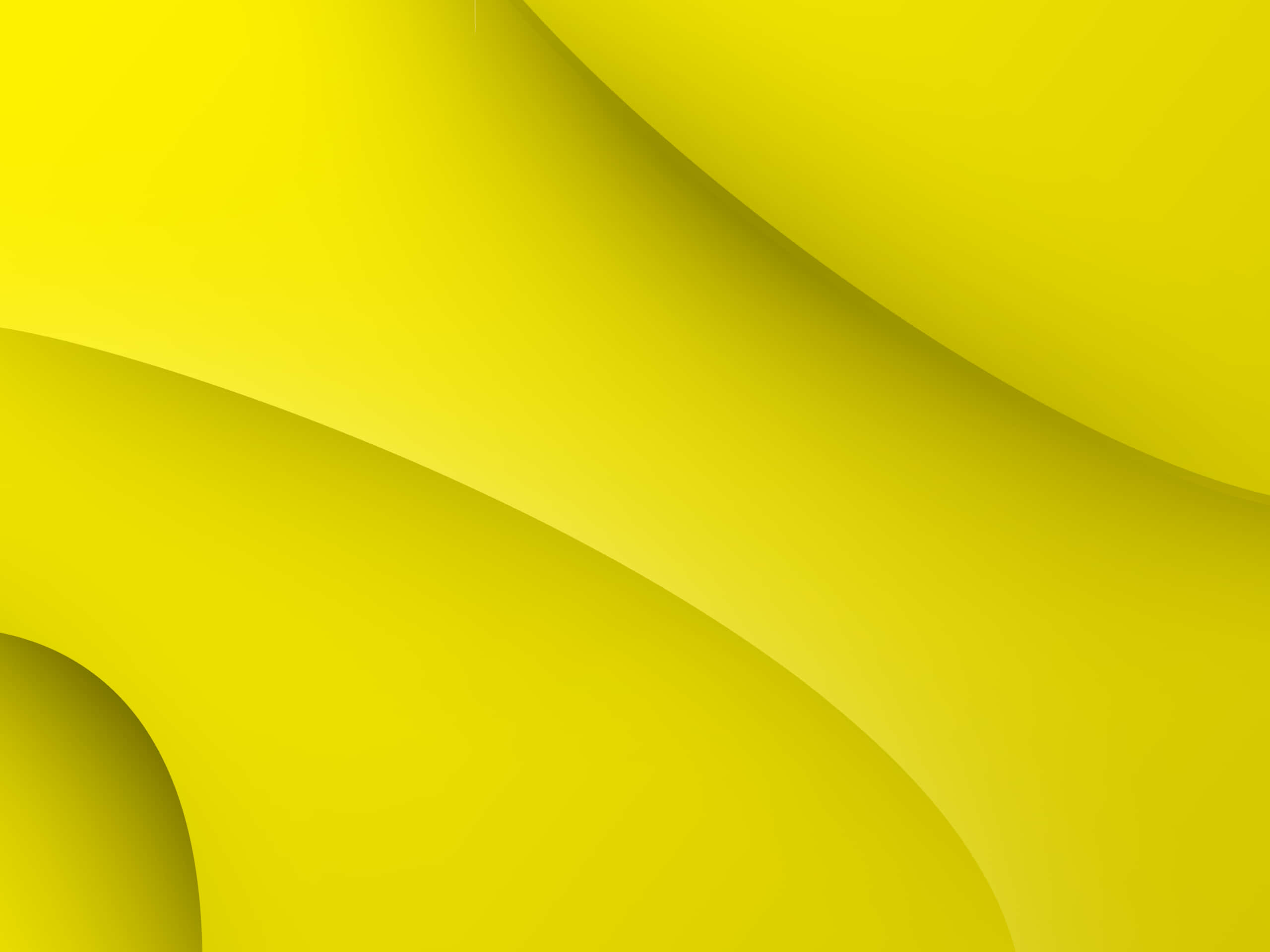 Image A Stylish Pastel Yellow Laptop On A Wooden Desk