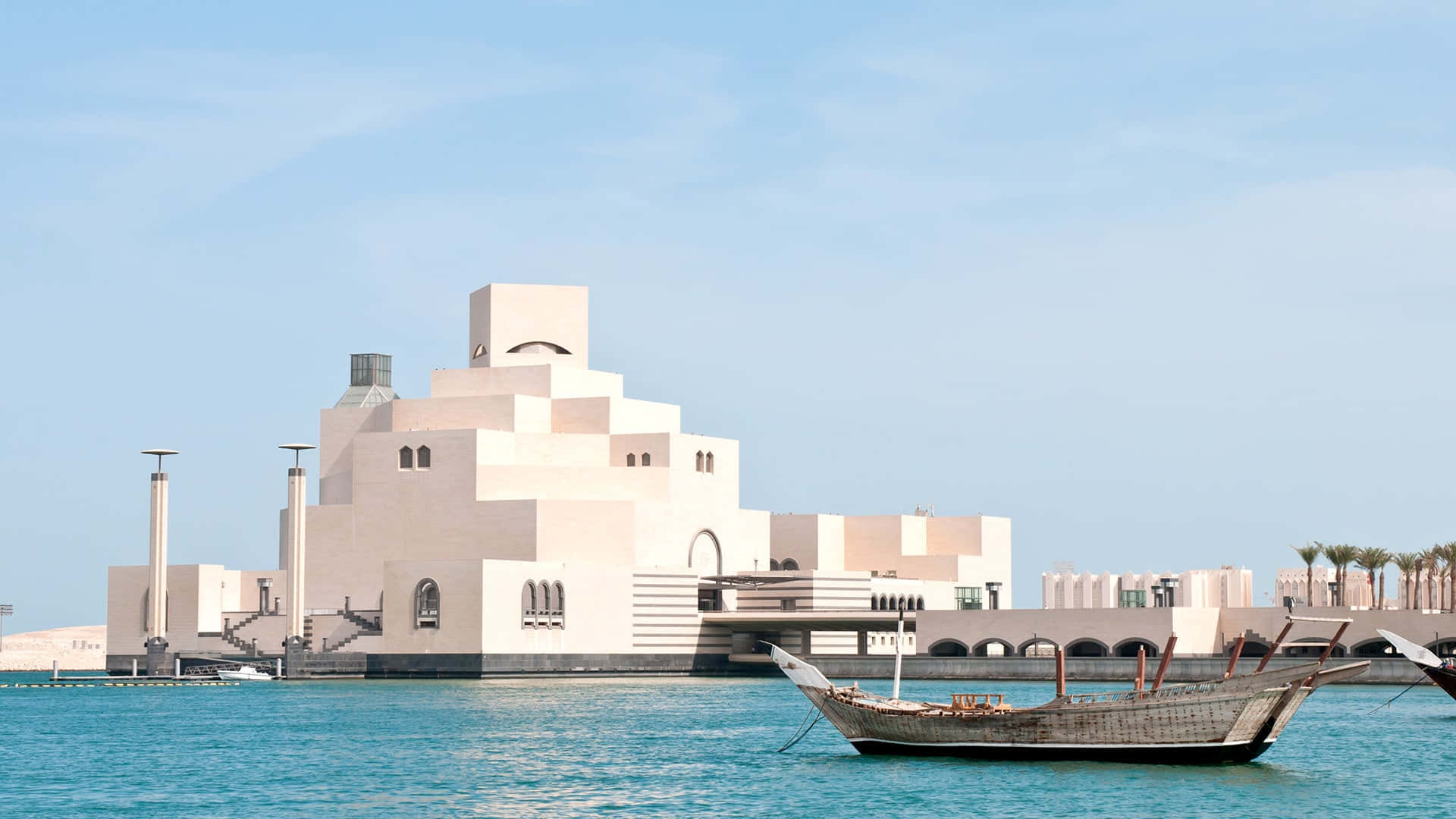 Spectacular View Of Boats Approaching The Museum Of Islamic Art