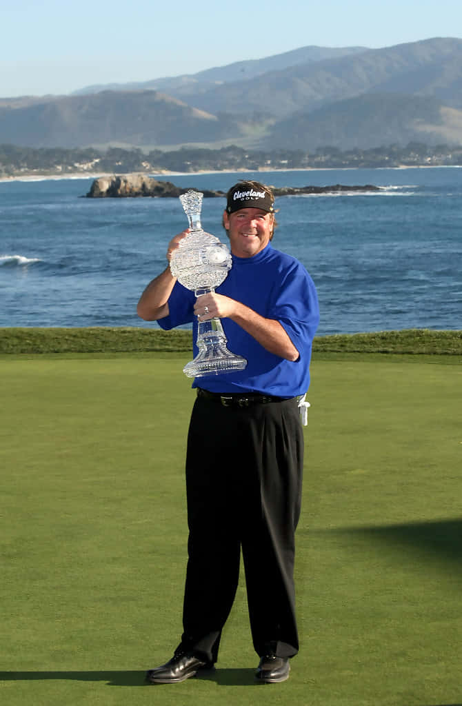 Steve Lowery Posing With Trophy