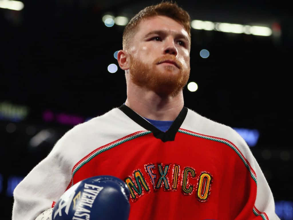 1. Professional Boxer Canelo Alvarez In A Victory Pose Wallpaper