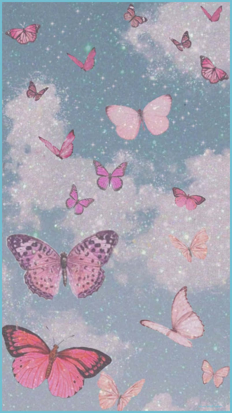 A Beautiful Glitter Butterfly Creating A Sparkling Spectacle Wallpaper