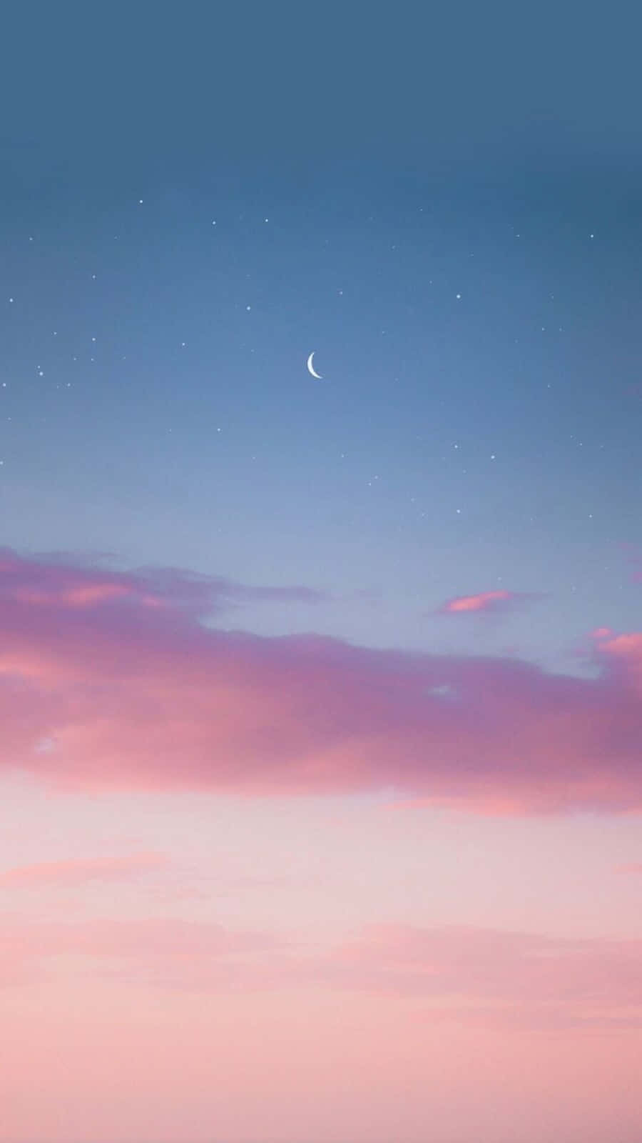 A Beautiful Landscape Of Pink And Blue Hues Wallpaper