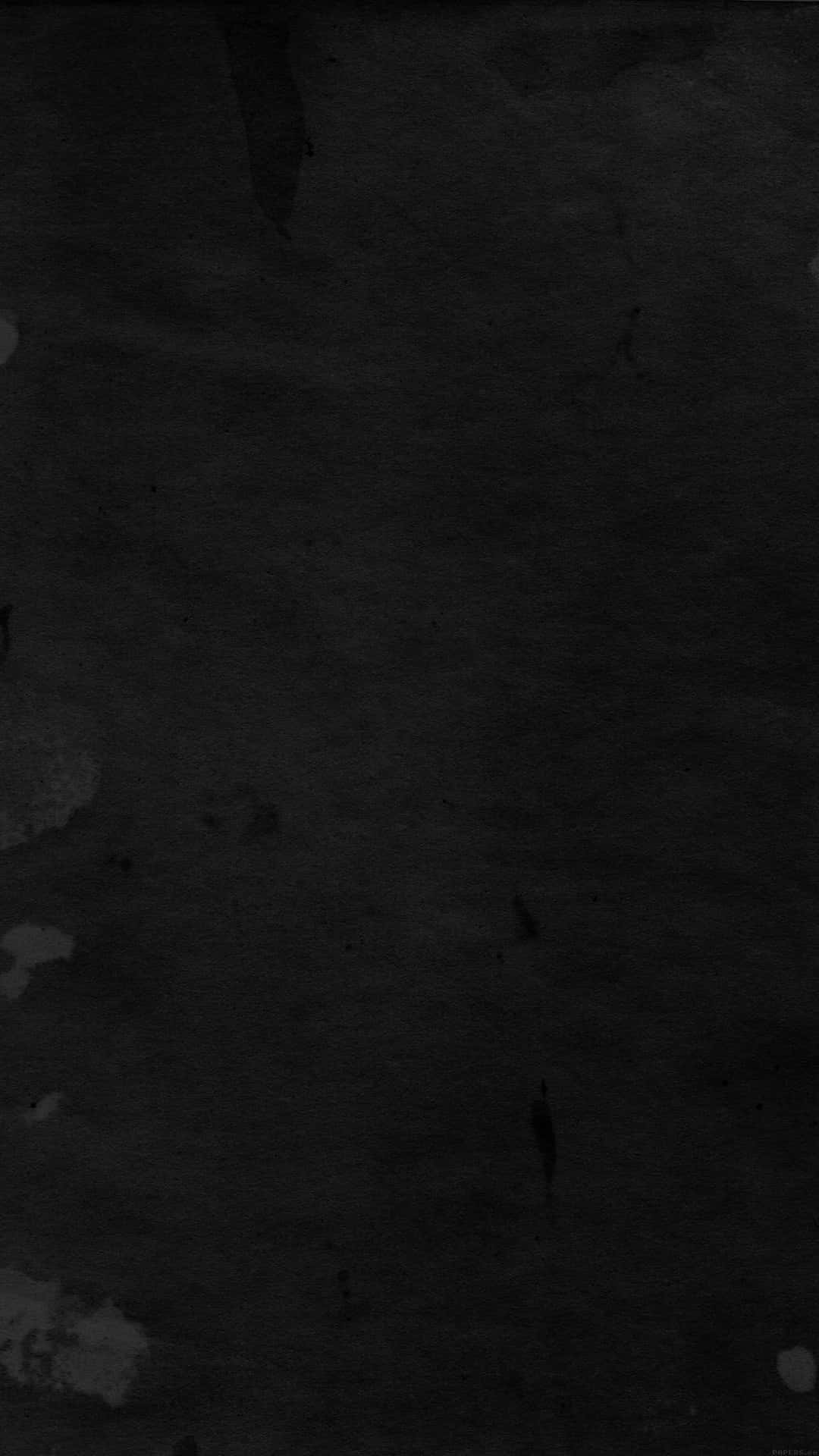 A Black And White Background With A Black And White Splatter Wallpaper