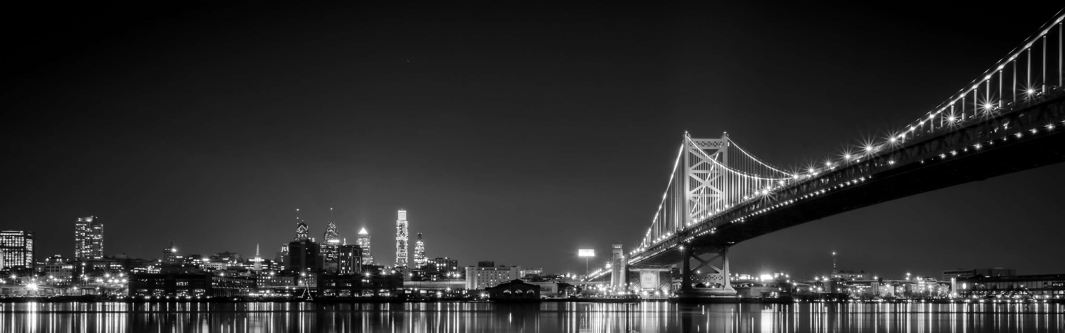 A Black And White View Of The Golden Gate Bridge In San Francisco Wallpaper