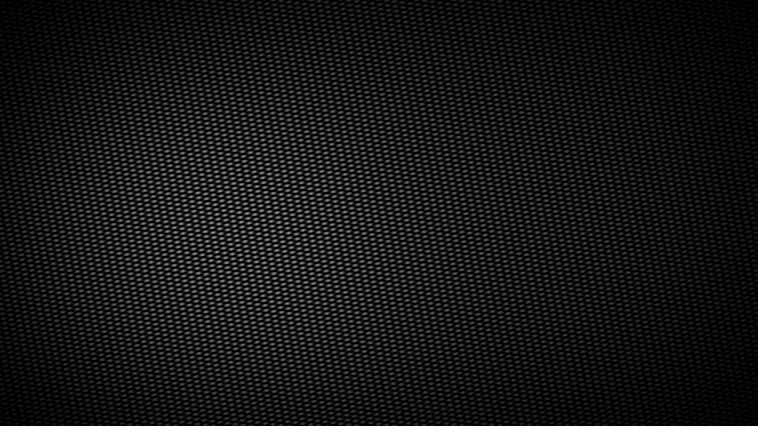 A Black Background With A Pattern Of Holes Wallpaper