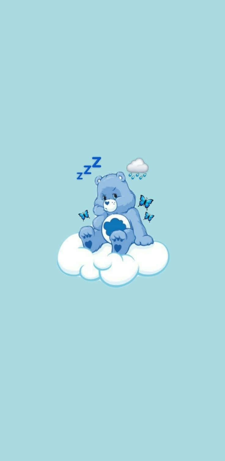 A Blue Bear Sitting On A Cloud Wallpaper