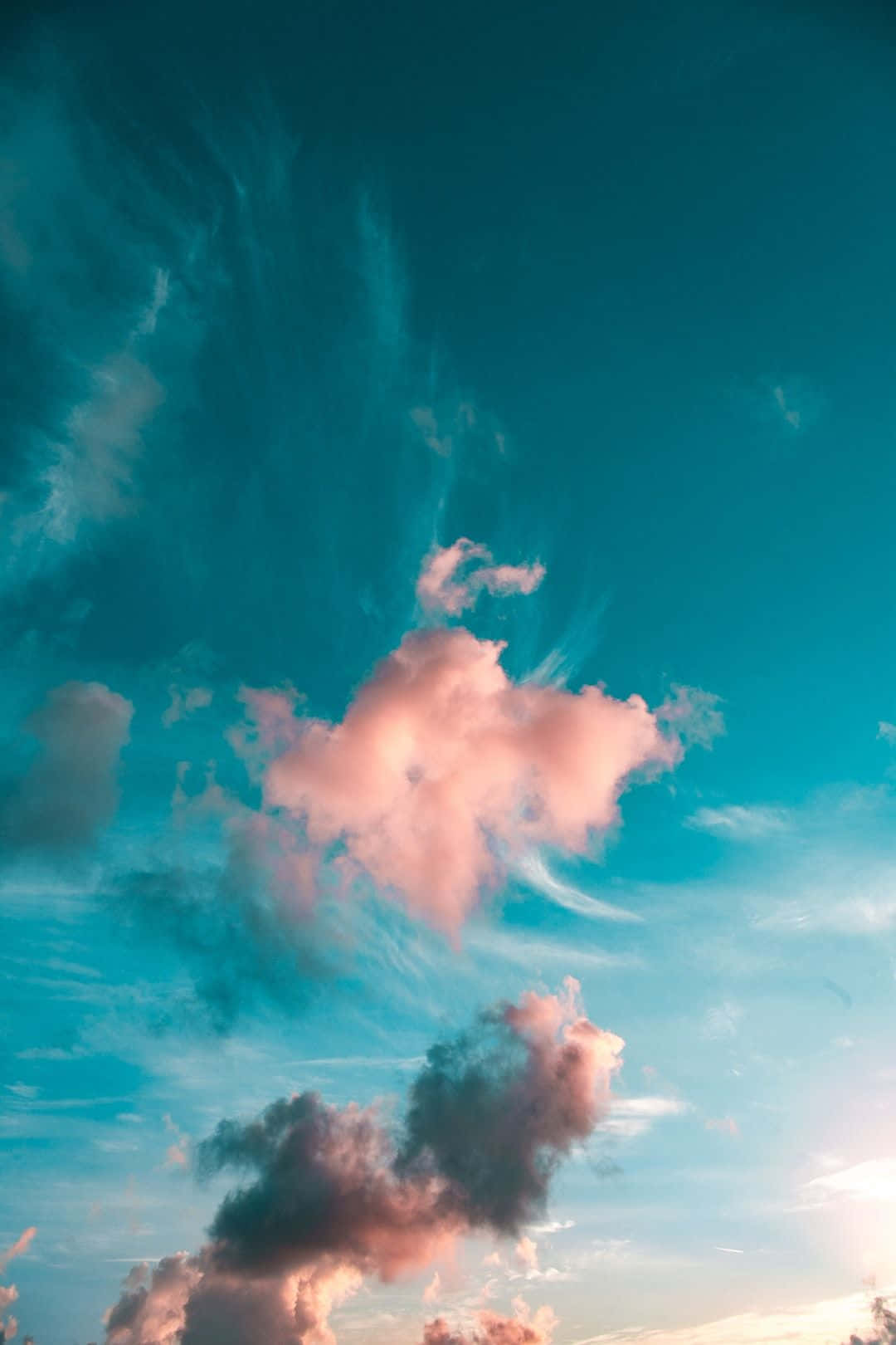 A Blue Sky With Clouds And A Boat Wallpaper