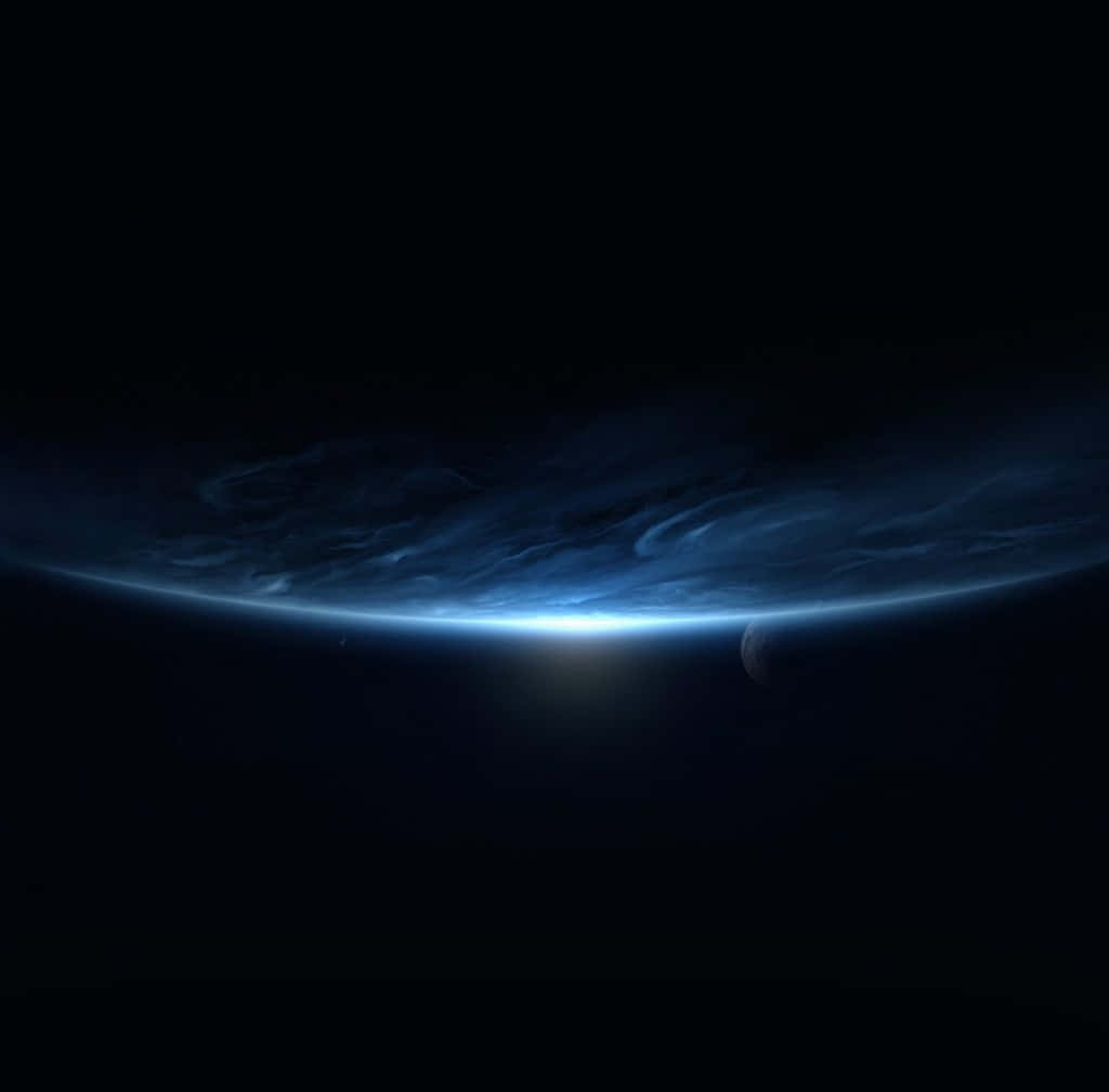 A Blue Space Background With A Blue Planet Wallpaper