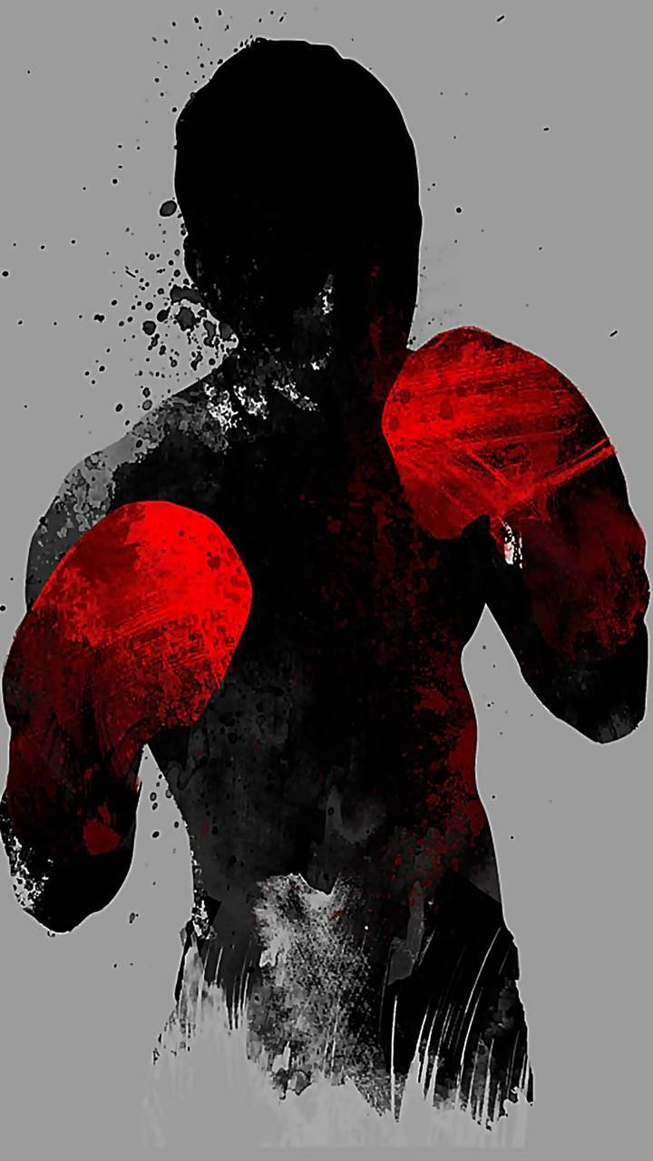 A Boxer With Red Gloves Is Shown On A Gray Background Wallpaper