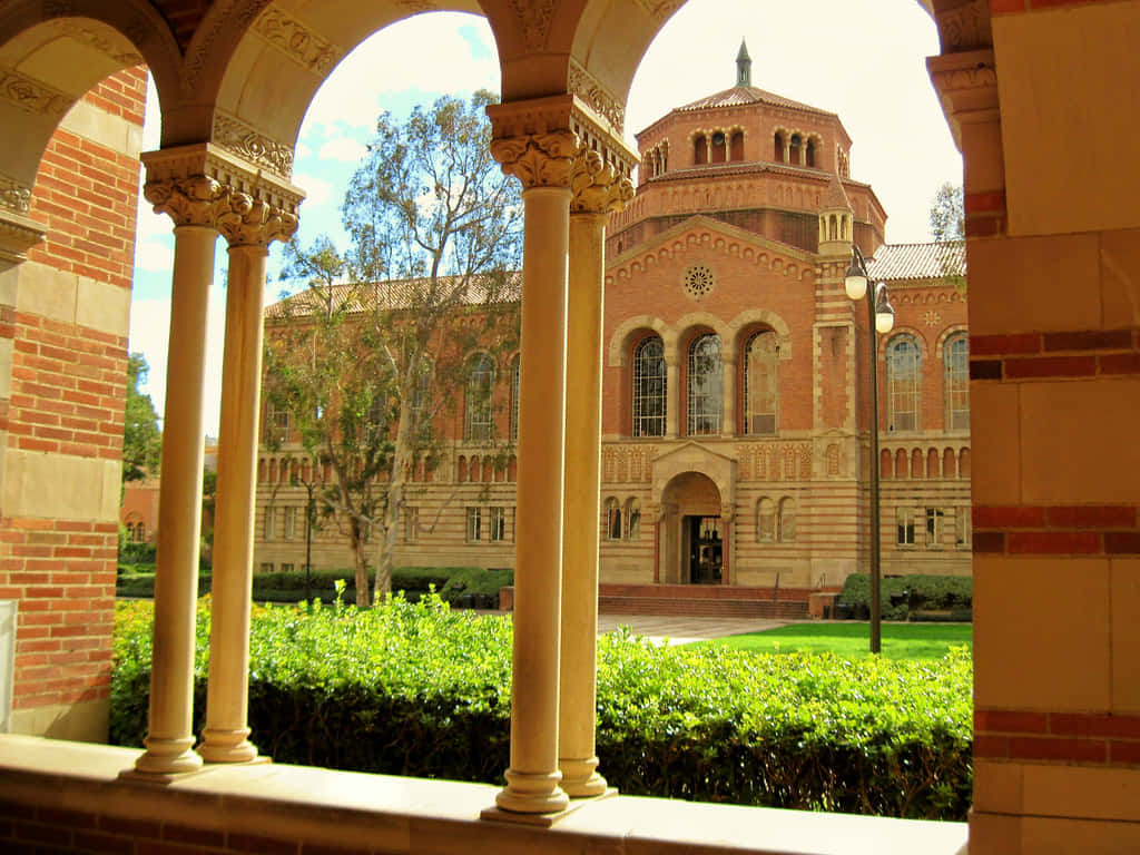 A Brick Building With Arches Wallpaper