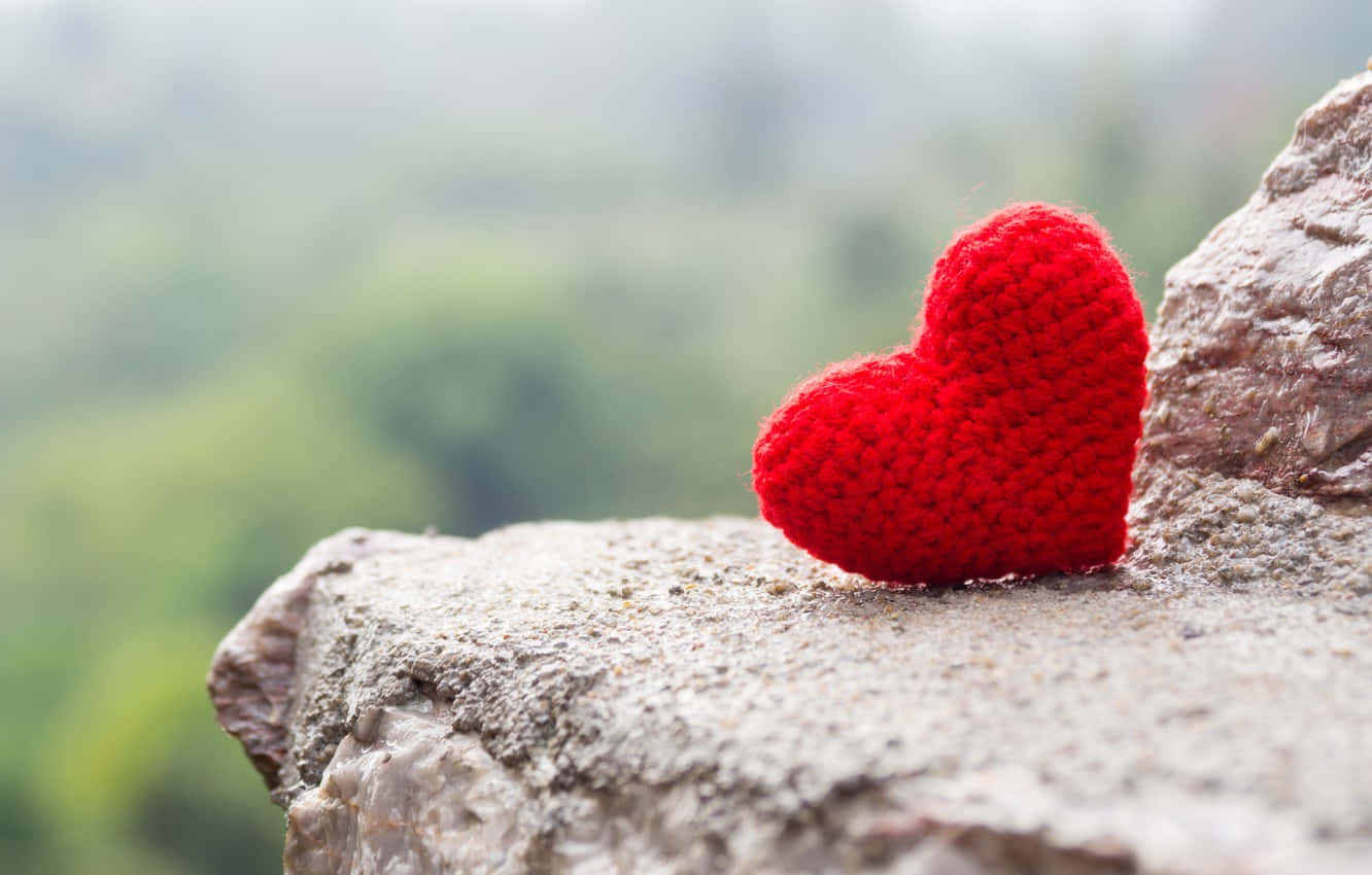 A Bright And Vibrant Red Heart, Bursting With Love Wallpaper