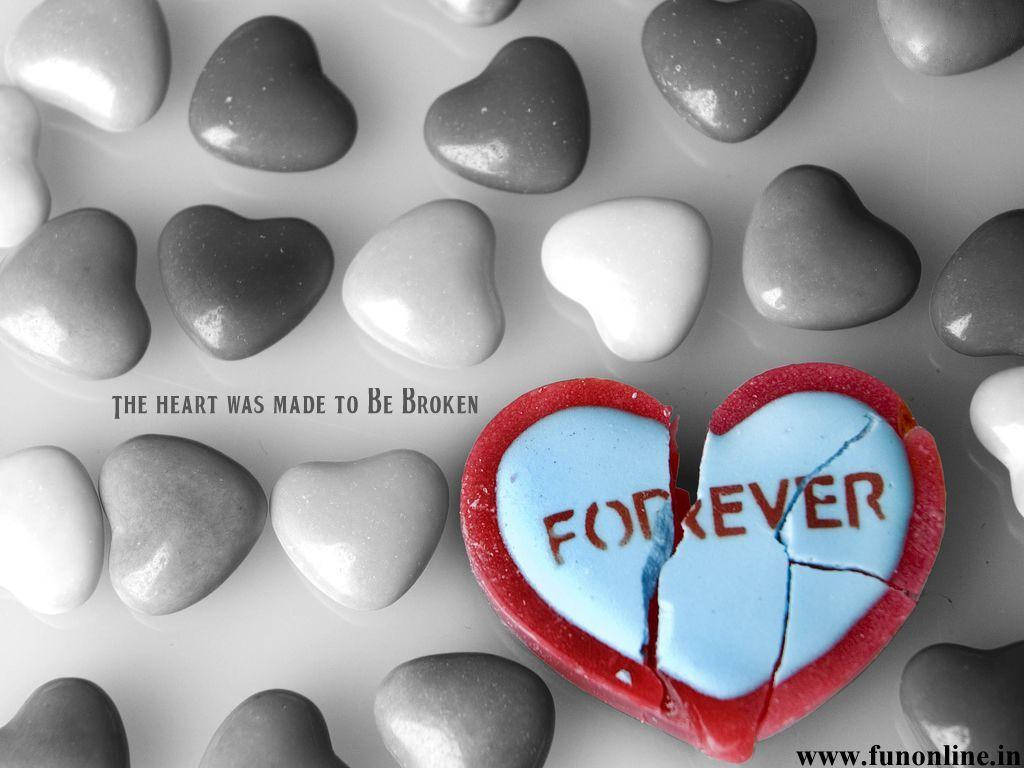 A Broken Heart Signifying The End Of A Relationship Wallpaper