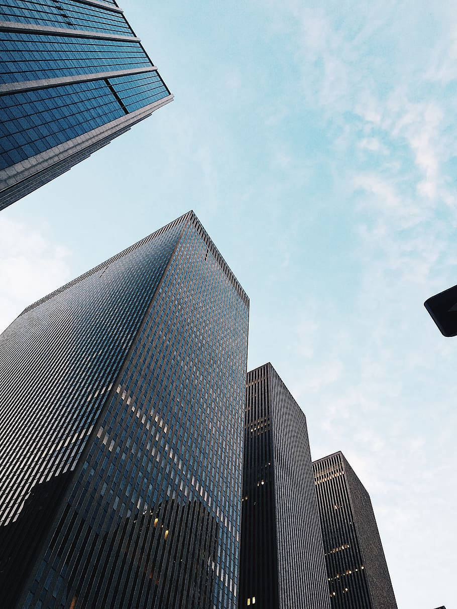 A City Street With Tall Buildings Wallpaper