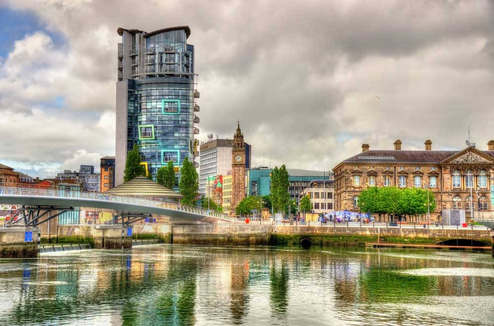 A City With A Bridge And Buildings In The Background Wallpaper