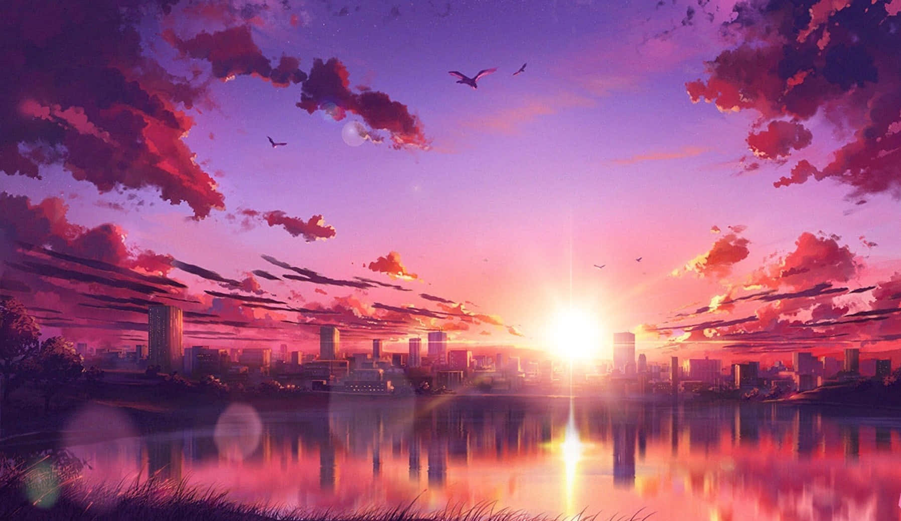 A City With A Sunset Over A Lake Wallpaper