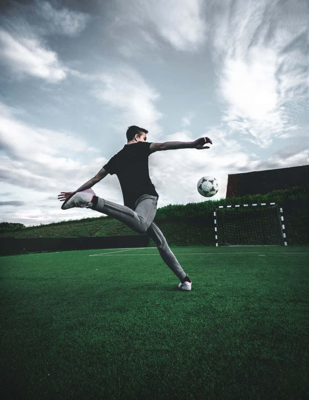 A Close-up Shot Of A Classic Black And White Soccer Ball Wallpaper