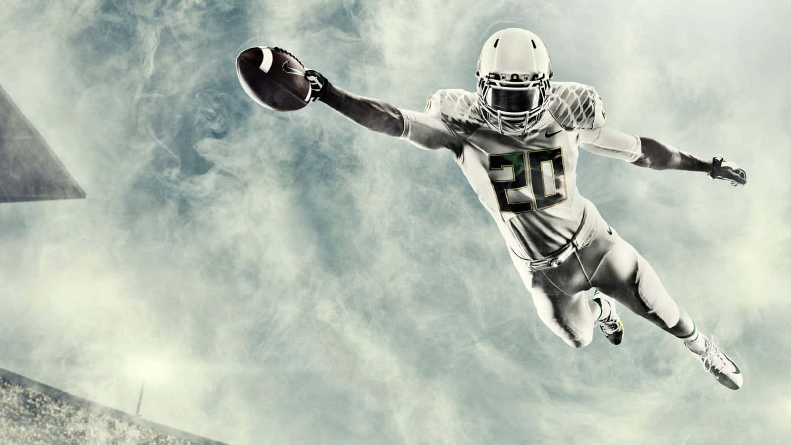 A Football Player In The Air Wallpaper