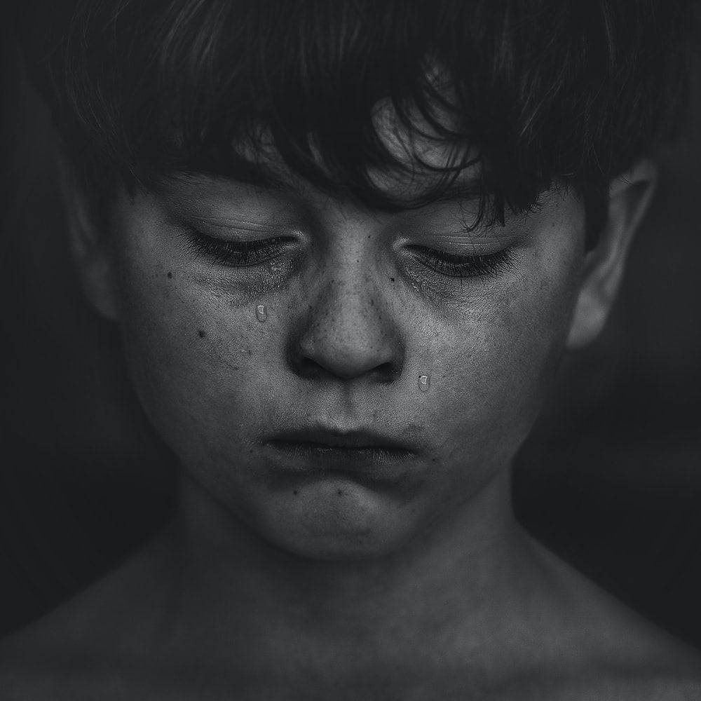 A Glimpse Of Hidden Sorrows - Sad Boy Crying Wallpaper
