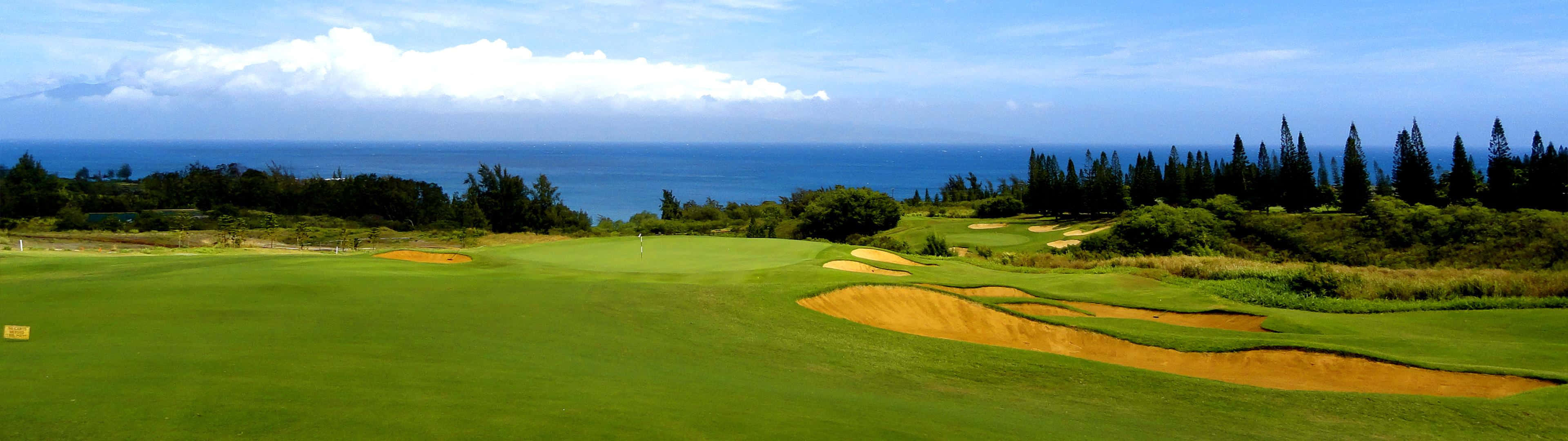 A Golf Ball Ready To Be Putted Against A Tranquil Landscape. Wallpaper