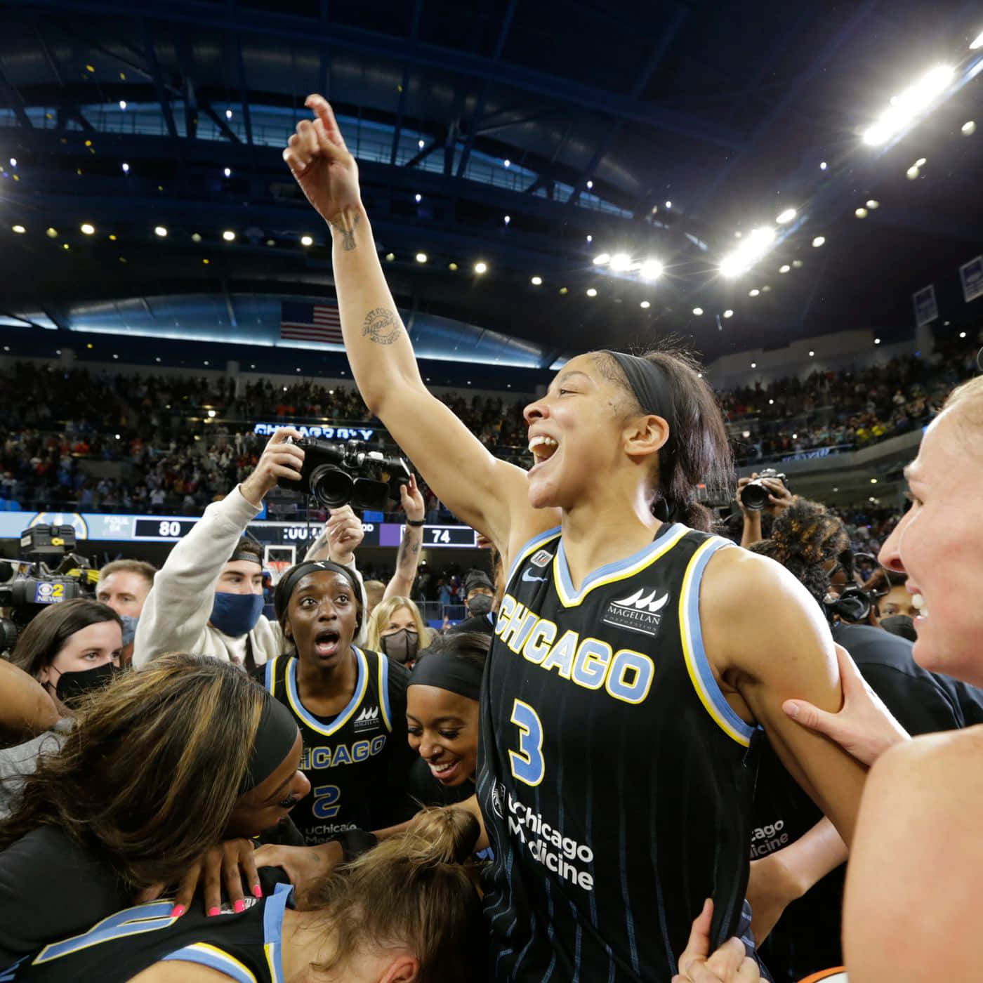 A Group Of Women Celebrating After Winning A Basketball Game Wallpaper