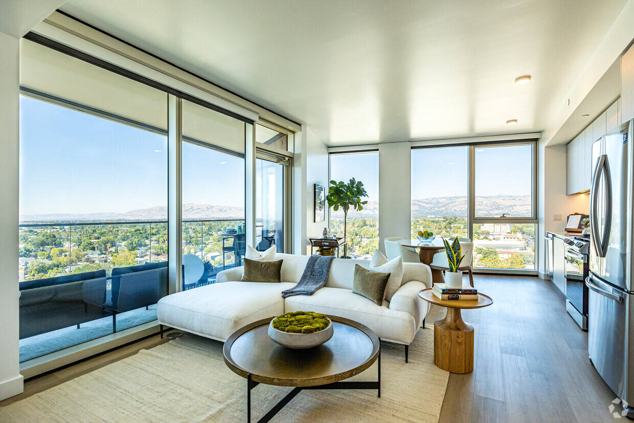 A Living Room With Large Windows Wallpaper