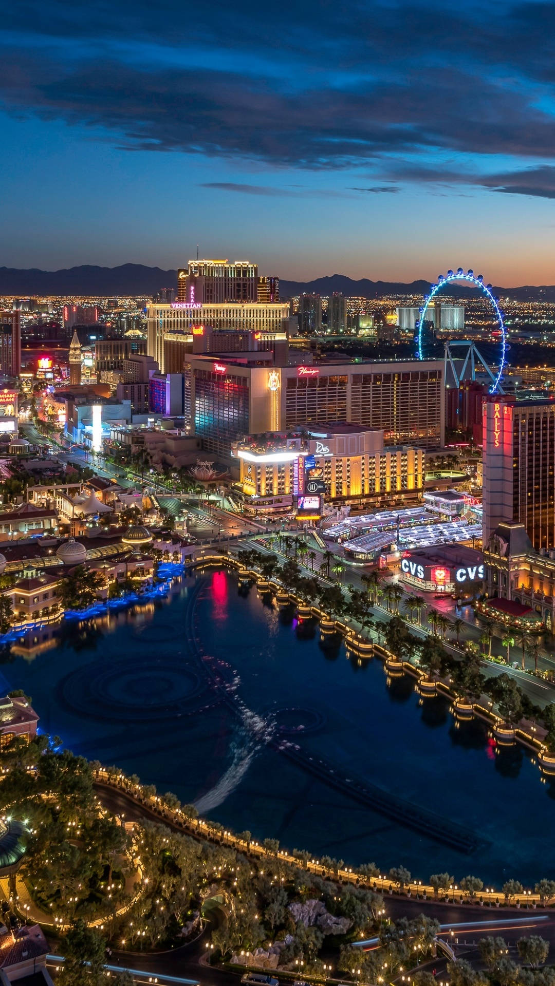 A Majestic View Of The Flamingo Hotel In Las Vegas Under The Star-studded Night Sky Wallpaper