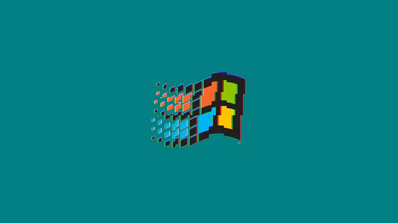 A Modern Laptop Featuring A Teal Aesthetic And Silver Color. Wallpaper