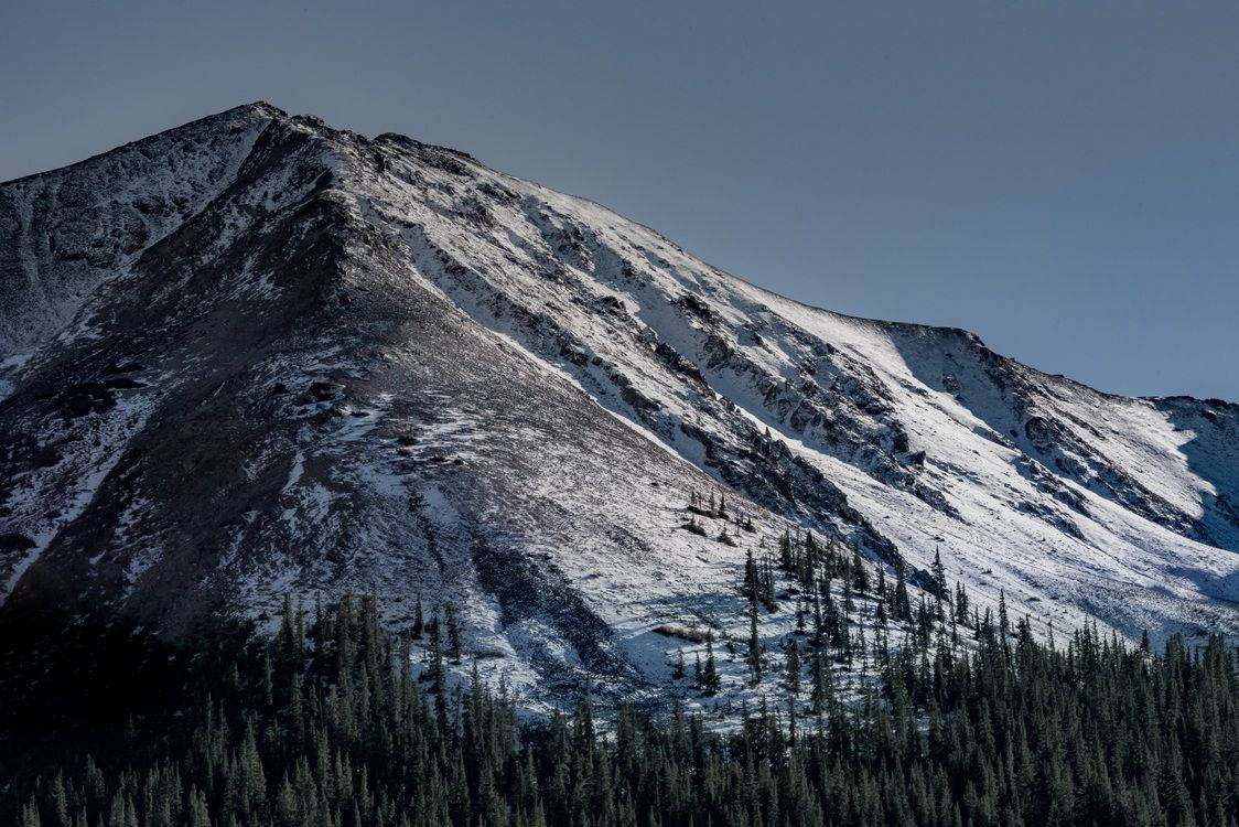 A Mountain With Snow On It Wallpaper