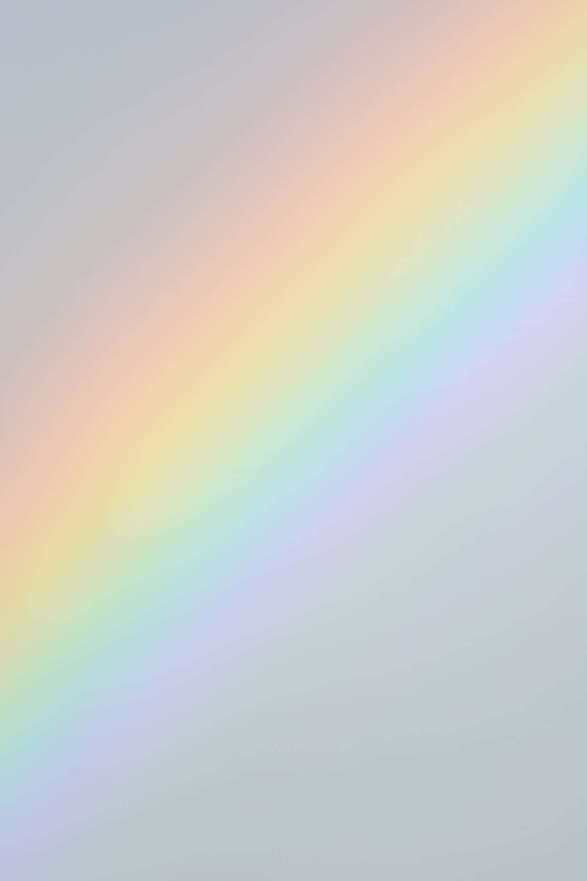 A Rainbow Is Shown On A Gray Background Wallpaper
