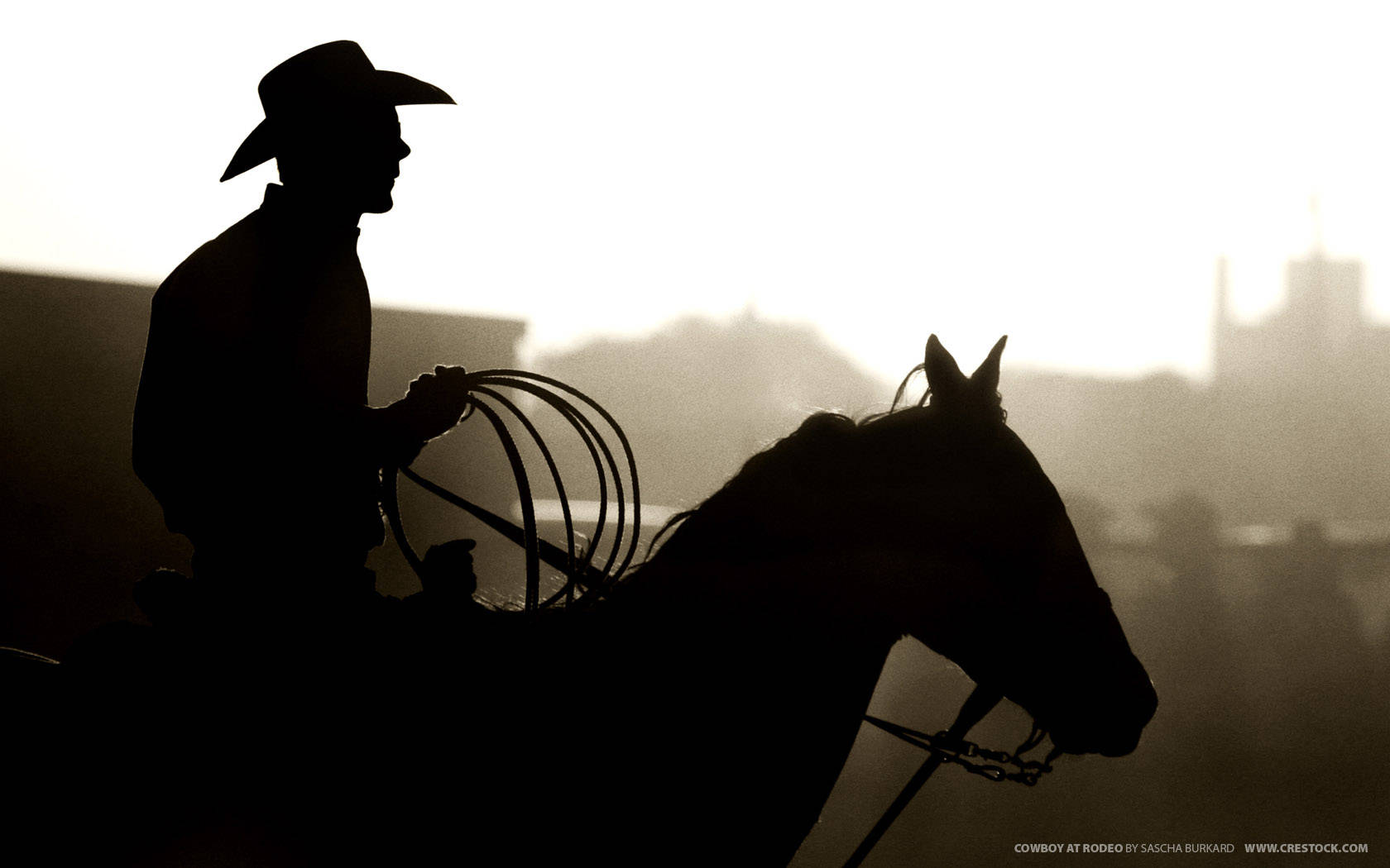 A Rugged American Cowboy Wearing A Traditional Stetson Hat. Wallpaper